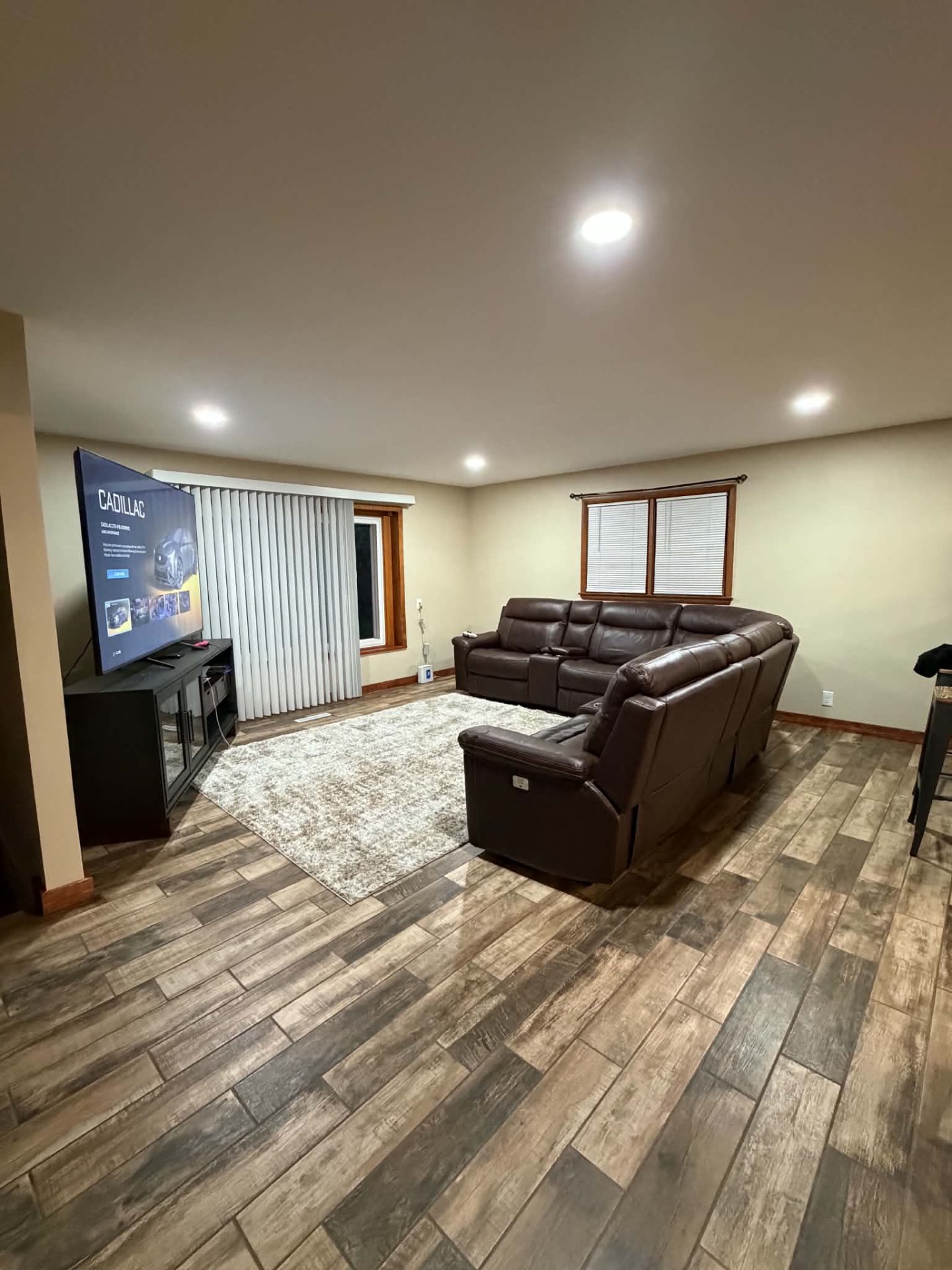 Another angle of the completed living room with seating and lighting